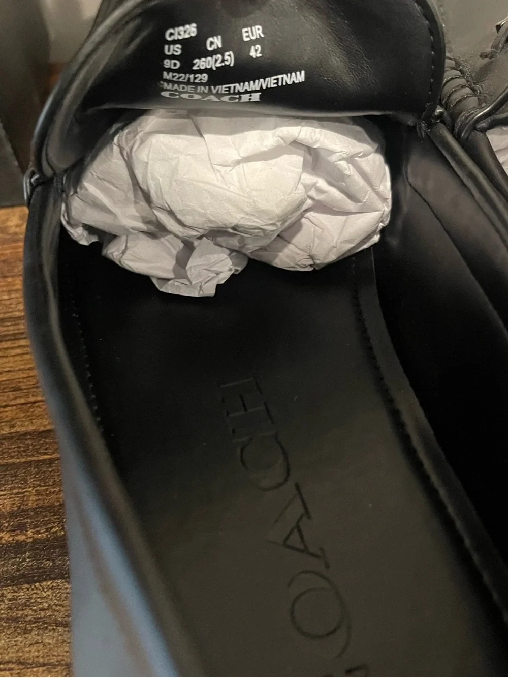 Coach polished black